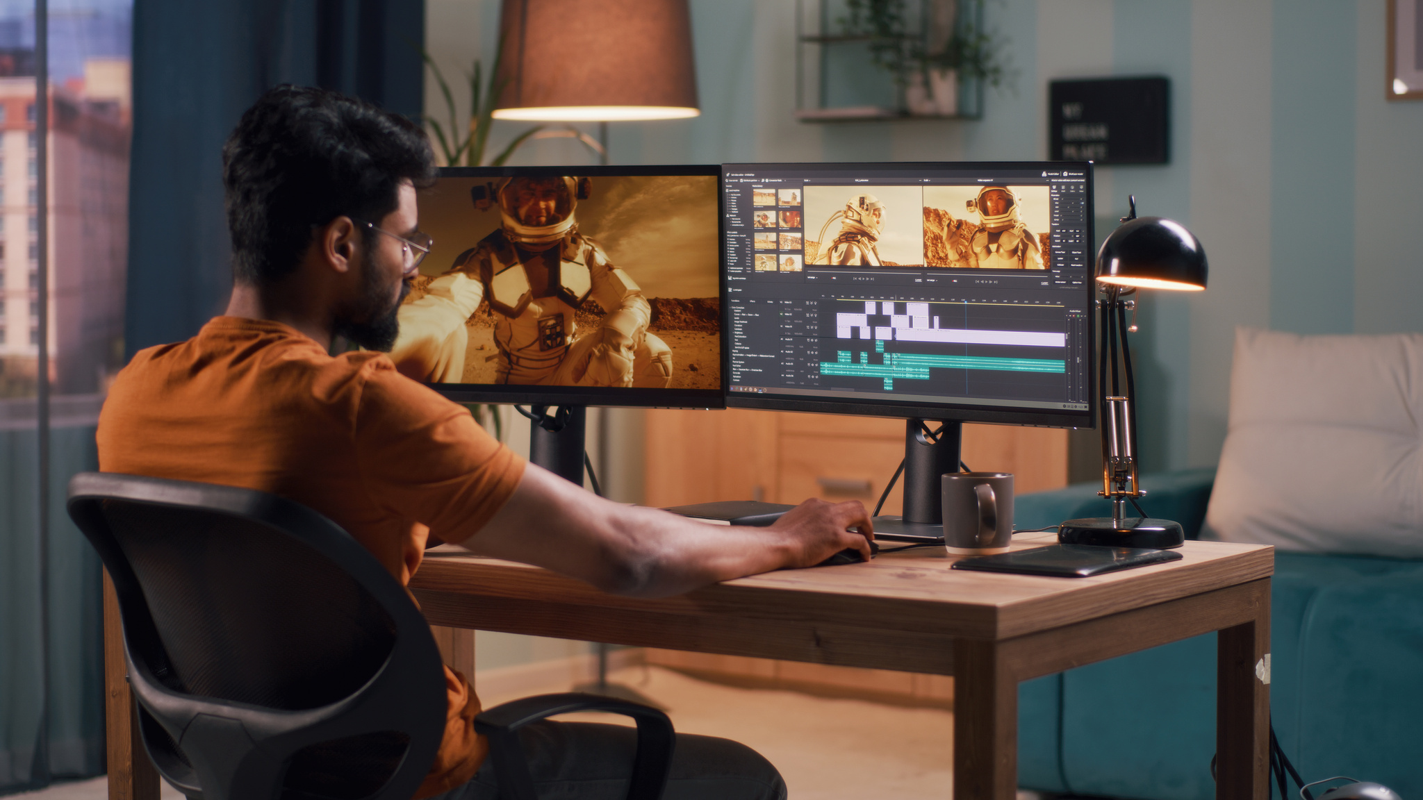 Unrecognizable guy editing astronaut video